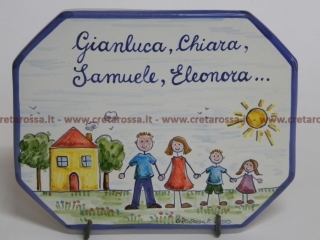 cod.art: nc95 - Mattonella in ceramica ottagonale cm 16x12 con decoro famiglia stilizzata e scritta personalizzata. 